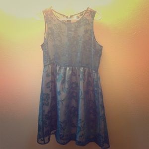 Navy blue dress with champagne underlay skirt