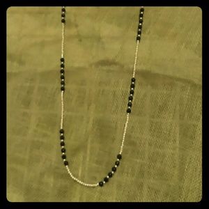 Black and pearl long necklace