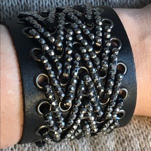 Beaded leather cuff. Very glam. Very rock & roll