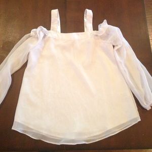Off shouldered flowy top.