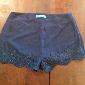 Navy blue shorts with lace trip