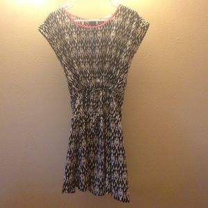 Short sleeve back and white dress.