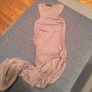 Calf length dress with ruche down the sides.