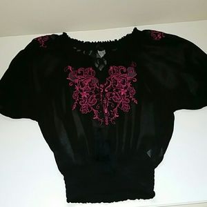black top with pink stitching