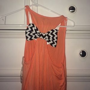 Orange tank with black and white bow tie back