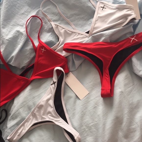 SELLING THE RED SET N WHITE BOTTOMS WHITE TOP SOLD