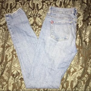 BDG light wash mid-rise denim with rips