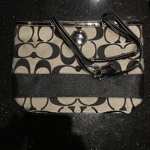 Black and gray, medium Coach purse