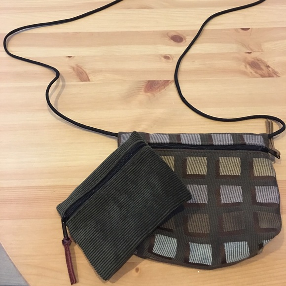 Small purse with little pouch .