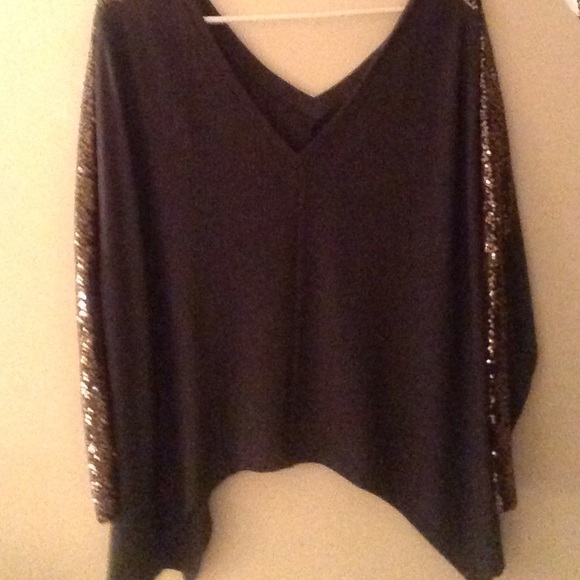 Gray sweater with gold sequin stripe on arms