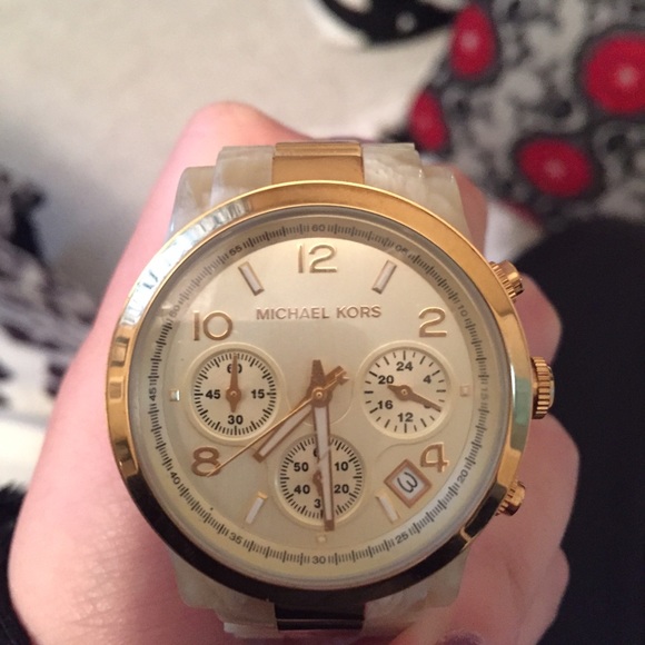 Michael Kors watch. Gold and ivory horn
