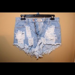 Vintage high waisted destroyed denim shorts