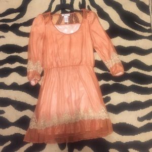 Orange/Peach dress size medium.