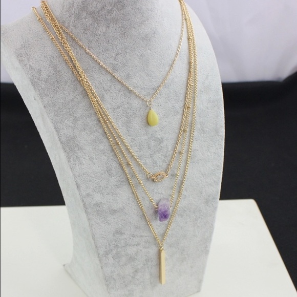 NEW! Multi-strand gold charm necklace.