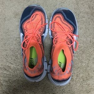 Nike Free orange and navy size 7. Worn once.