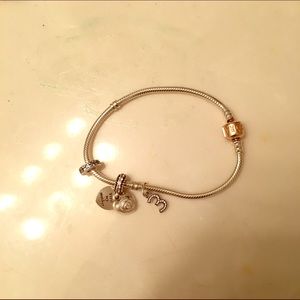 rose gold pandora bracelet with 3 charms