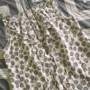 Flattering sleeveless polka dot blouse