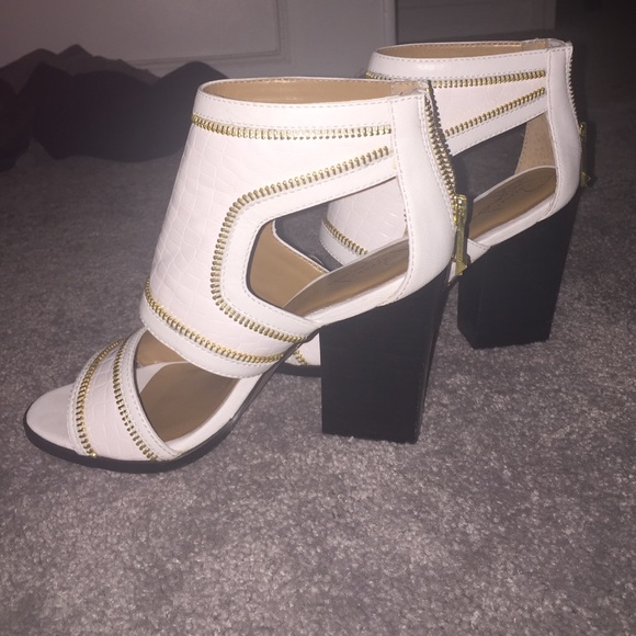 gold and white heeled booties