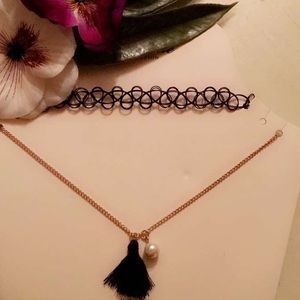 Tattoo choker and pearl necklace.