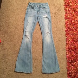 Flared distressed jeans