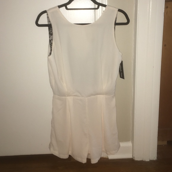 Lookbook store romper with lacy back! Tag still on