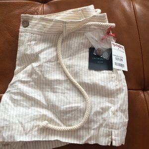 White and tan pin stripped shorts