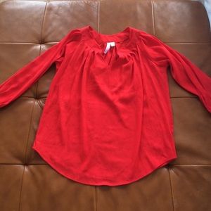V-neck red blouse