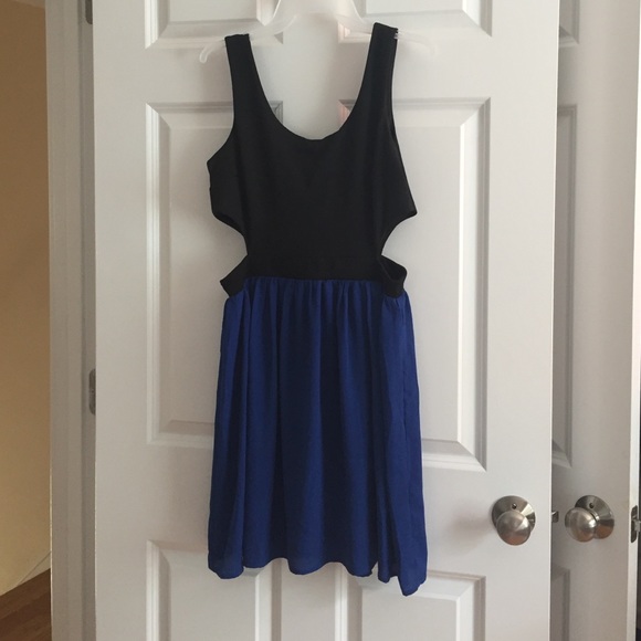 Dress with openings on side