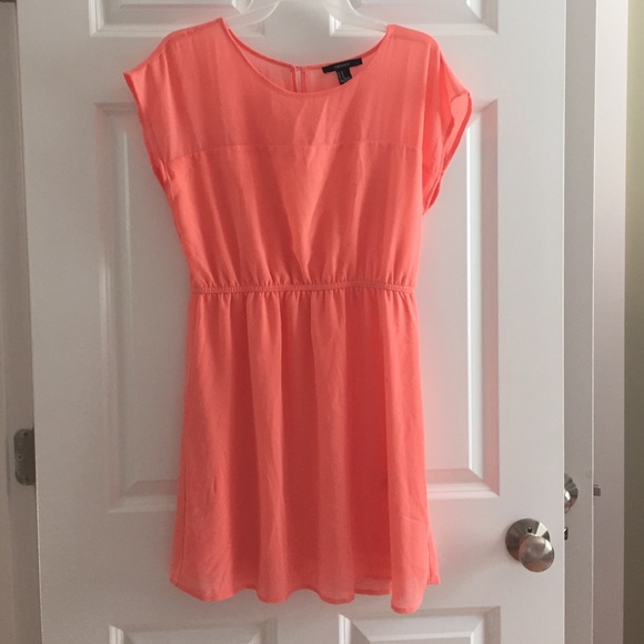 Peach/salmon flowey dress.