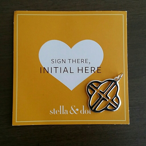 Stella L initial charm