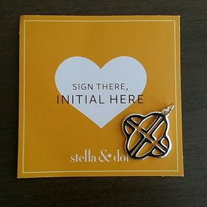 Stella L initial charm