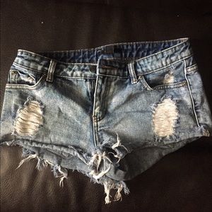 High waisted distressed shorts