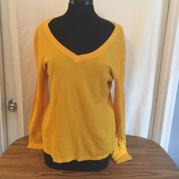 Gold long sleeve thermal tee.