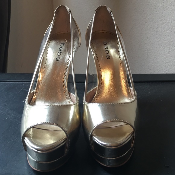 Gold open toed pumps