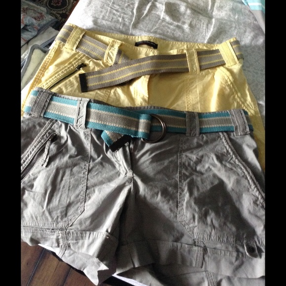 2 pair of shorts.. Grey and yellow with belts