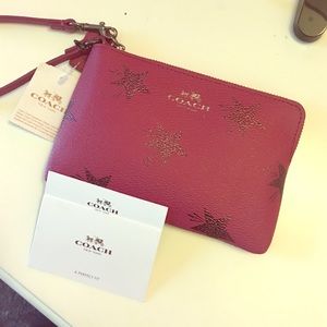 Like new, raspberry Coach wristlet