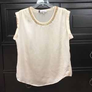 Jennifer Lopez off white top medium