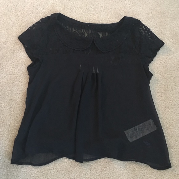 Navy blue collared short sleeve shirt