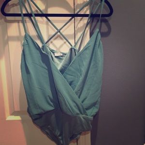 TObi teal blue bodysuit