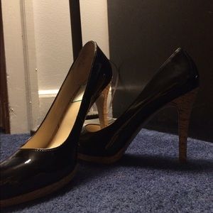 Black patent platform pumps with cork heel