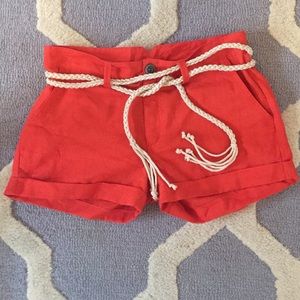 Red linen shorts with rope belt