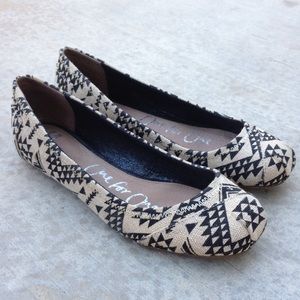 TOMS cream & black shoes