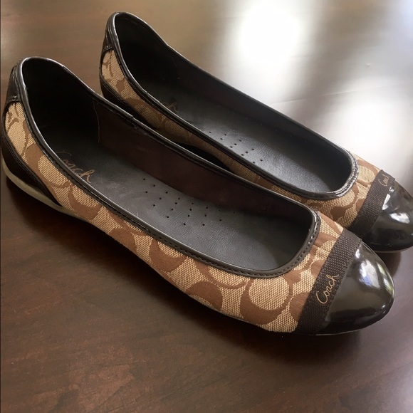 Brown coach flats