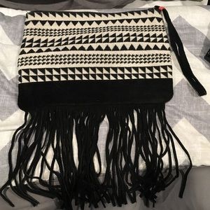 Boho style fringe wristlet.