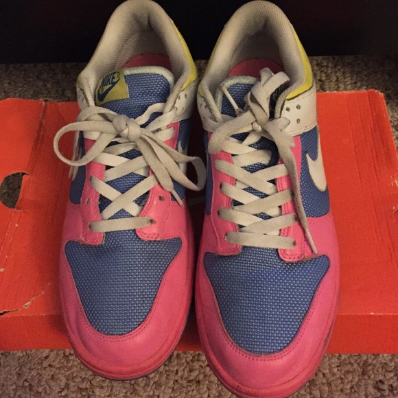 Neon pink Nike dunk lows