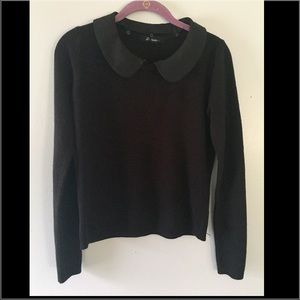 Black collared sweater