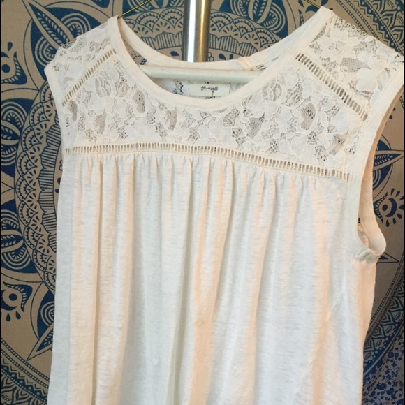 White sleeveless top