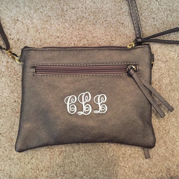 Grey clutch with monogram "CLL"