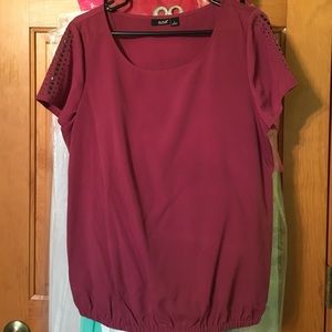Maroon top. Embellished shoulders
