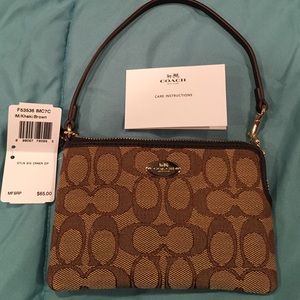 Cute Brown Coach Wristlet. Must Have!!! 👜